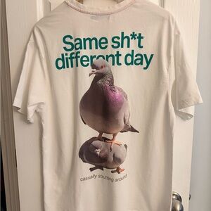White T-Shirt with Purple Pigeon Graphic